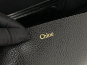 Chlo Spin tote bag in black grained leather